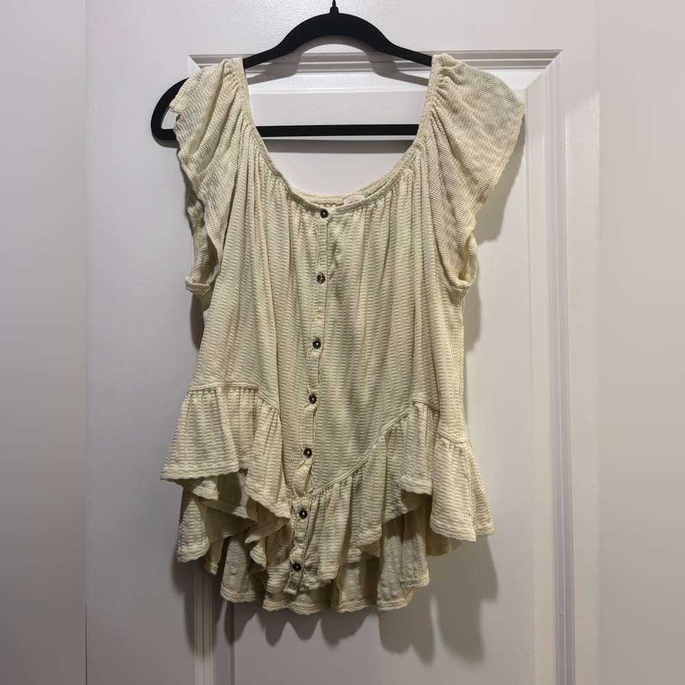 Pale yellow flowy button down top, can be worn on or off the shoulder!